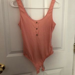 Peach body suit